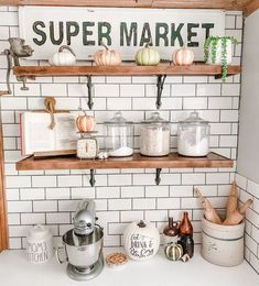 a kitchen counter topped with lots of different types of food and cooking utensils