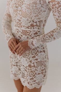 Introducing our Camila mini dress, the glamorous choice for any bride seeking a chic and contemporary look. Made from luxurious lace, this dress is adorned with ornamental ribbon at the bottom edge of the skirt, sleeves and collar, adding a touch of sophistication and elegance. With its timeless design and magnificent lace, this dress is perfect for various wedding events, including engagement parties, rehearsal dinners, and even as a second wedding dress. Pair Camila dress with our stunning Sam Second Wedding Dress, Lulus Bridal, Bridal Clothes, Second Wedding Dresses, Second Wedding, Engagement Parties, Colors For Skin Tone, Second Weddings, Bridal Inspo