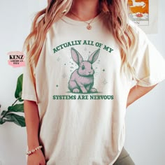 Vintage Actually All Of My Systems Are Nervous Funny Mental Health Shirt Meme Shirt Anxiety Tee Coquette Fairycore Weirdcore Shirts that go hard 90s Style Graphic T-Shirt, Retro Raccoon Shirt, Trendy Shirts, Adult Unisex Relaxed Shirt, Washed Tee Browse our selection of more shirts/sweatshirts ------ https://www.etsy.com/shop/KenzAmericanTee?ref=seller-platform-mcnav NOTE: We use Comfort Color tees for Vintage Distressed and Grey Distressed             We use Gildan tees for all other colors. ✿ Ink Leaves, Funny Mental Health, Raccoon Shirt, Etsy Promotion, Ehlers Danlos, Dtf Printer, Shirt Designs For Men, Shirt Print Design, Shirts Design