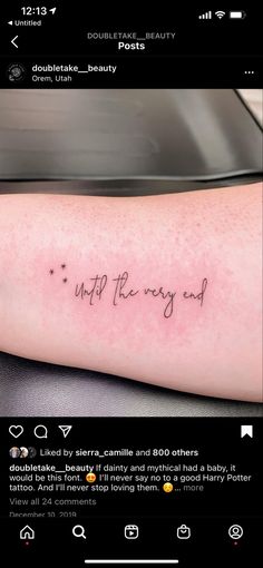 a person with a tattoo on their arm that reads, up the way out and it is