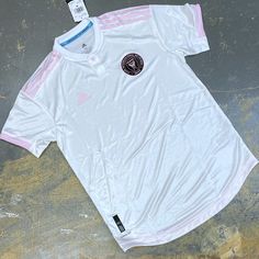 Selling A Brand New With Tags Adidas Miami Club International Authentic Soccer Jersey Top In White And Light Pink Stripes And Adidas Logo And A Stitched Imcf Team Crest On The Chest! Inaugural Season Jersey With Subtle Flamingo Design. Adult Medium Chest Measures 20.5 Inches Pit To Pit Length Measures 30 Inches Collar To Bottom Msrp $130 Adidas Id Eh8360 Click Add To Bundlebelow To Receive An Offer! Combine Items And Save On Shipping! David Beckham Logo Chicago Bulls, Orlando City Soccer, Chicago Bulls Basketball, Miami Club, Yellow Adidas, Mls Soccer, Flamingo Design, Gold Adidas, Adidas Three Stripes