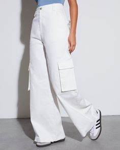 Combine the look of a tailored trouser with the laidback approach of baggy cargo pants and you'll get the Jacklin Cargo Trouser Pants. This pair sits high on the waist and features a wide leg fit. Dress it up or down your way. High rise Fitted waist Wide pant leg Side, back & cargo pockets Front zip fly & button closure 97% Cotton 3% Spandex Runs Large Trendy Solid Straight Leg Parachute Pants, Trendy Straight Leg Pants With Cargo Pockets, Trendy Straight Leg Pants With Multiple Pockets, Trendy Straight Parachute Pants With Pockets, Trendy Straight Pants With Multiple Pockets, Trendy White Full-length Cargo Jeans, Trendy White Full Length Cargo Jeans, Trendy High-waist Parachute Pants With Pockets, Relaxed Fit Solid Color Cargo Jeans