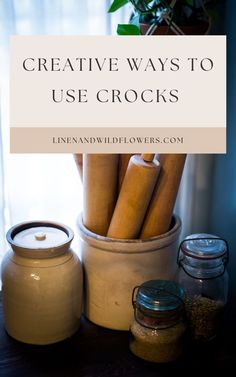 some jars with wooden sticks in them and the words creative ways to use crocks