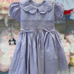 Size 2 Smock Dress White Collar On Purple Dress With Embroidered Ribbons *Similar Style Pictured, Only Used For Color/Style Reference New In Packaging Short Sleeve Smocked Dress For Baptism, Cotton Smock Dress For Playtime, Cute Short Sleeve Dress With Smocked Cuffs, Cute Cotton Smocked Baptism Dress, Cotton Smocked Dress With Short Sleeves For Playtime, Cotton Dresses With Smocked Cuffs For Playtime, Whale Dress, Ladybug Dress, Hand Smocked Dress