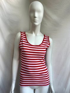 Vintage striped t-shirt from Moschino Jeans. Red and white top Size I44 USA10 GB14, fits S-XL tag Condition 7/10 (last photo) Made in Italy Underarm to underarm - cm/" Length - cm/" Sleeve length  - cm/" 📍 follow the shop on Instagram: @𝚔𝚘𝚛𝚊𝚛𝚎_𝚟𝚒𝚗𝚝𝚊𝚐𝚎 All measurements taken with garment lying flat.  Vintage sizes vary greatly! We recommend comparing measurements with a similar style garment you own for best fit! If you have any other questions, please contact us. No refund. Y2k Striped Cotton Tops, Casual White Tank Top With Contrast Stripes, Casual Fitted Tops With Horizontal Stripes, Fitted Striped Y2k Top, Vertical Striped Fitted Tops, Fitted Striped Tank Top, White Horizontal Stripe Top For Spring, White T-shirt With Horizontal Stripes For Summer, White Horizontal Stripe T-shirt For Summer