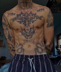 "Incredible Chest Tattoos for Men: 10 Unique and Eye-Catching Designs" Chest Tattoos For Men, Thigh Piece Tattoos, Tattoo Homme, Full Chest Tattoos, Unique Tattoos For Men, Torso Tattoos, Tattoo Inspiration Men, Pieces Tattoo, Chest Tattoos