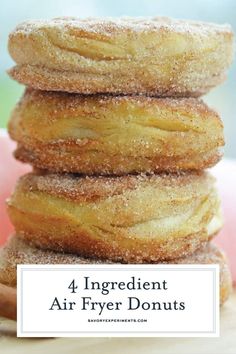 four ingredient air fryer donuts stacked on top of each other with cinnamon sticks