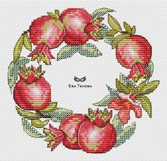 a cross stitch pattern with pomegranates and leaves in the shape of a circle