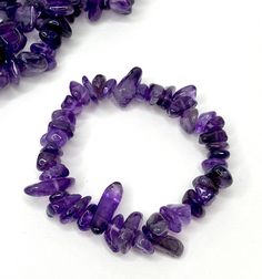 Amethyst Chips Bracelet You will receive 1 (ONE) Amethyst Chips Bracelet similar to the item in the picture Great for mixing and matching with other regular bracelets. . Amethyst has healing powers to help with physical ailments, emotional issues, and in Energy Healing and Chakra balancing. Amethyst crystal therapies are primarily associated with physical ailments of the nervous system, the curing of nightmares and insomnia, and balancing the crown chakra. FOLLOW US ON INSTAGRAM @earthsmineralsi Amethyst Beaded Bracelets With Round Beads, Spiritual Purple Beaded Bracelets With Stones, Purple Amethyst Stretch Bracelet With Natural Stones, Purple Crystal Bracelet For Gift, Amethyst Beaded Bracelet For Healing, Purple Spiritual Crystal Bracelet With Stones, Spiritual Purple Crystal Bracelet With Stones, Adjustable Purple Beaded Stone Bracelets, Adjustable Purple Beaded Bracelets With Stones