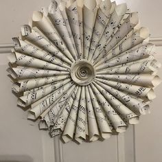 a wreath made out of sheet music notes