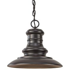 an old fashioned pendant light hanging from a chain