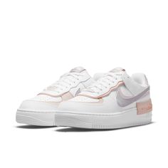 If you’re looking for a smooth, stylish shoe that will offer comfort, style and everything else in between, then the Nike Air Force 1 Low Shadow ‘White Pink Oxford’ Women could be the perfect choice. This luxurious pair of shoes is perfect for any occasion, combining premium materials, sleek accents and effortless style. Its all-white leather upper offers a soft, buttery feel underfoot perfect for playing sports or racing around town, while eyelets come in delicate baby pink color to add subtle feminine touches. The classic Nike Swoosh appears on the side in an elegant pastel purple , and it's set atop a thick white sole for fluid movement. With its grand combination of features and luxurious aesthetic, this pair of sneakers will definitely turn heads wherever you go. Air Nike, Nike X Travis Scott, Ugg Ultra Mini, Nike Air Force 1 Shadow, White Oxford, Air Force 1 Shadow, Low Air Jordan 1, Converse Run Star, Jordan 8