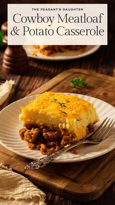 a white plate topped with a slice of cowboy meat and potato casserole