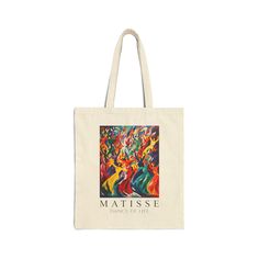 a tote bag with the words matissee on it and an abstract painting