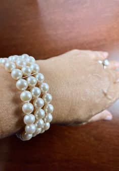 This Adorable 3-strand Japanese Cultured Akoya Pearl Bracelet set of 7.5-8mm AAA quality perfect round Akoya pearls with length of 7 inches ( can be personalized to the length you wanted). It is beautifully knotted with Japanese silk thread and secured with 7mm bead spacing dividers( Silver or 14KT white or yellow gold of your choice). It is the best gift for the bride and add the class and elegancy to your wedding. It can be finished with a Sterling Silver Square/Round Filigree clasp or 14KT Yellow Gold/White Gold Square/Round Filigree clasp. A perfect wedding gift! Elegant Adjustable Cream Pearl Bracelet, Elegant Pearl Bracelet With 8mm Beads, Elegant Pearl White Bracelets With 8mm Beads, Elegant Pearl White Beaded Bracelets With 8mm Beads, Elegant Cream Pearl Bracelet With Round Beads, Elegant Hand-strung Pearl White Bracelet, Elegant Cream Pearl Bracelet As A Gift, Elegant Cream Pearl Bracelet As Gift, Elegant Cream Pearl Bracelet Gift