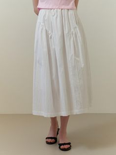 This voluminous skirt has wide, flare silhouette. It is accentuated with shirred detail throughout for feminine mood. Pair yours with the coordinating jumper.  - Natural, relaxed silhouette- Cotton and nylon blend fabric - Shirred waist and sides- Back zip fastenings- Comfortable banded back waist White Ruched Long Skirt, White Long Ruched Skirt, White Voluminous Skirt For Daywear, White Gathered Skirt For Daywear, White Ruched Flowy Skirt, White Dress With Gathered Voluminous Skirt, White A-line Voluminous Skirt, White Ruched Skirt, White Skirt With Pleated Waist And Voluminous Fit