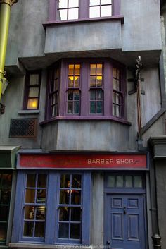 the corner of a building with several windows