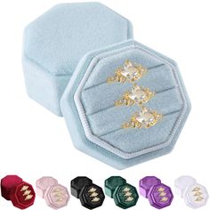 an open velvet jewelry box with four different colors and designs on the front, along with five other options