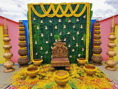 a decorated stage with flowers and candles