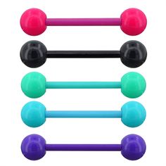 an assortment of different colored balls and barbells