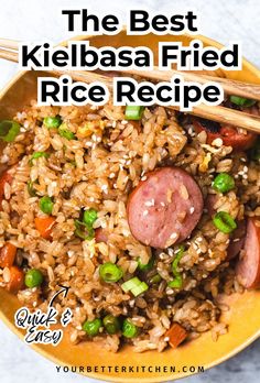 the best kielbasa fried rice recipe in a yellow bowl with chopsticks