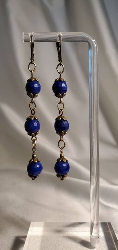 Lightweight blue faceted Quartz 8mm beads times 3 make each of these strands. The earrings measures 3 inches and dangle from bronze Leverbacks. Black Jewelry, Blue Quartz, Strand Necklace, Freshwater Pearls, Hippie Boho, Jewelry Earrings Dangle, Swarovski Crystals, Jewelry Box, Dangle Drop Earrings