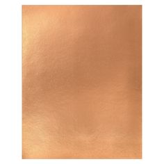 a close up view of an orange metallic sheet with some light brown highlights on it