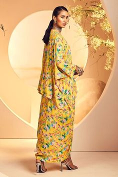 Yellow three fourth sleeves poncho crafted in crepe with all over floral chintz print and dabka hand embroidered yoke detail. Paired with a matching draped dhoti skirt. - Aza Fashions Festive Kimono With Traditional Drape, Shraddha Kapoor, Luxury Sale, Poncho Pattern, Modern Bride, Aza Fashion, Fashion Set, Womens Skirt, Types Of Sleeves