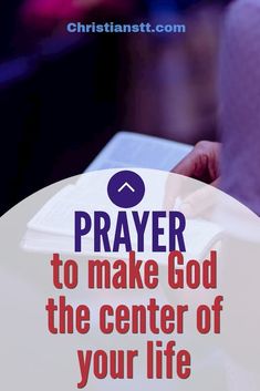 a person holding a book with the words prayer to make god the center of your life