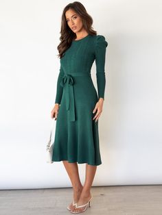 Indulge in luxury with our Robin Tie Waist Sweater Midi Dress in elegant emerald green. The tie waist accentuates your figure while the midi length adds a touch of sophistication. Made from a soft and comfortable knit, this dress is perfect for all-day wear. Elevate your style with this exclusive piece. Size Guide: Model is 5’8” tall, and has a 33.5” bust, 26.4” waist, & 35.6” hips. She is wearing a S / US 4 / AU 8. This sweater dress is true to size. Material: 100% Cotton. Feature: Crew neckline. Ruched shoulder. Long sleeves. Ribbed Soft knit fabric. Tie Waist. Midi length. Relaxed fit. Care Instructions: Machine wash / Cold hand wash Cable Knit Dress, Kate Middleton Outfits, Woolen Dresses, Cable Knit Sweater Dress, Womens Knit Dresses, Costume Intero, Long Sleeve Knit Dress, Sweater Dresses, Long Sleeve Sweater Dress