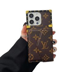 a person holding an iphone case in their hand with louis vuitton on it