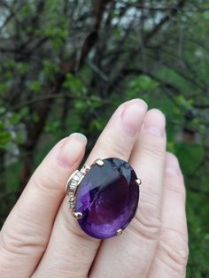 Absolutely Stunning 14k Yellow Gold,  huge,  approximately 40ct Amethyst in dark Deep Purple color , Baguette Diamonds on the side Ring.. Size about 7 Weight over 22 Grams.. Ring is in good Pre Owned Condition  All sales are Final no return.  ALL ITEMS FROM MY SHOP MUST BE PURCHASED STRAIGHT FROM ETSY.COM WEBSITE  Not thru Google and Others Offsite ads... Luxury Baguette Cut Gemstones For Gift, Luxury Baguette Cut Gemstones, Luxury Amethyst Ring For Wedding With Polished Finish, Luxury Polished Amethyst Ring For Wedding, Luxury Emerald Cut Amethyst Wedding Ring, Purple Baguette Cut Rings For Formal Occasions, Elegant Marquise Amethyst Ring, Baguette Cut Amethyst Ring For Formal Occasions, Elegant Purple Amethyst Baguette Cut Ring