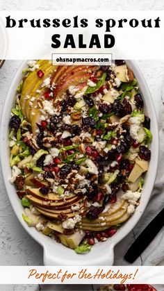 an image of a salad with apples and cranberries in it on a table