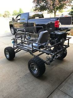 an off road vehicle is parked on the sidewalk