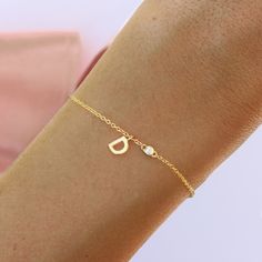 "Mini Initial Letter Personalized Bracelet / Necklace 14K Gold with Diamond / Birthstone Product details: ♥ Material: 14K, yellow / white /rose solid gold. ♥ Letter size 6mm. ♥ Natural diamond 0.02ct F color, VS clarity Or We can place your wanted birthstone. if you want a birthstone please write us your wanted type in the checkout note. ♥ Select your chain length bracelet : 15cm -19cm / Necklace 42cm Please select your wanted bracelet length and gold color in drop down menu. --- Silly Shiny Ser Personalized Dainty Yellow Gold Diamond Bracelet, Diamond Name Bracelet For Gift, Fine Jewelry, Fine Jewelry Diamond Name Bracelet For Gift, Fine Jewelry Diamond Name Bracelet As Gift, Gold Diamond Bracelet With Birthstone, Elegant Gold Diamond Bracelet With Birthstone, Elegant Gold Diamond Birthstone Bracelet, Gold Diamond Bracelet With Birthstone For Fine Jewelry, Gold Diamond Bracelet With Birthstone In 14k Gold