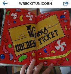 a hand holding an open book with the title waka golden ticket