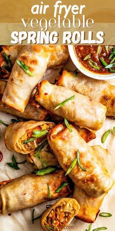 air fryer vegetable spring rolls with sauce on the side and text overlay that reads, air fryer vegetable spring rolls