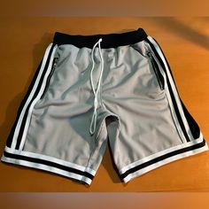 High Quality Basketball Shorts With A Minimal Approach To Ath-Leisure. Gray Athleisure Bottoms For Summer, Gray Athleisure Summer Pants, Gray Sporty Summer Pants, Sporty Gray Summer Pants, Sporty Gray Pants For Summer, Sporty Gray Athletic Shorts For Spring, Gray Bottoms For Summer Streetwear, Gray Summer Streetwear Bottoms, Gray Sports Bottoms For Spring