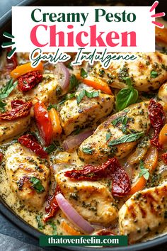 creamy pesto chicken with garlic and red peppers in a skillet on a table