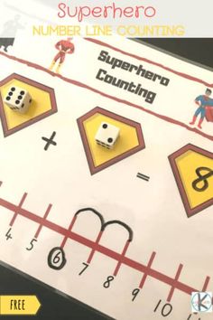 a number line counting game with dices and numbers on the side, in front of a ruler