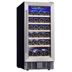 the wine cooler has many bottles in it