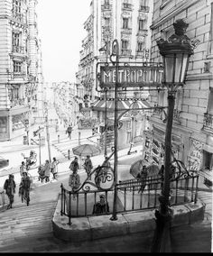 black and white drawing of people walking down the street