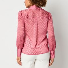 Made from smooth satin, this Worthington women's blouse offers a flattering, flowy feel that pairs well with dress pants for professional settings or with jeans for a laid-back yet polished outfit. It's cut for a regular-fit and has a V-neck with a chic tie-neck detail, a chevron pattern and long cuffed sleeves.Closure Type: ButtonFit: Regular FitNeckline: V NeckSleeve Length: Long SleeveApparel Length: 26 InchesFiber Content: 59% Rayon, 41% PolyesterFabric Description: JacquardCare: Machine Wa… Pink Blouse, Chevron Pattern, Sheer Blouse, Tie Neck, Top Tee, Dress Pants, Neck Tie, Shirts Tops, Sleeve Blouse