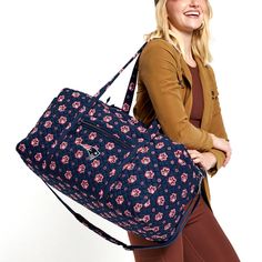 Explore the Vera Bradley NFL lineup of top-rated styles sure to capture your team spirit. This duffel has it all! Interior pockets keep your cosmetics, flat irons and socks all sorted. The exterior pockets keep boarding passes, reading material or snacks close by. Exterior features one zip and three slip pockets Interior features three mesh slip pockets Detachable shoulder strap has shoulder pad for comfort Zip closure Capacity 50 L. Vera Bradley NFL Large Travel Duffel Bag Women in New England Vera Bradley Travel Bag, Travel Duffel Bag, Boarding Passes, Fleece Patterns, Flat Irons, Backpack Lunch Bag, Duffel Bag Backpack, Travel Duffel, Duffel Bag Travel