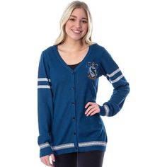 Show off your support for the wisest house in all of Hogwarts with this cozy button-down cardigan featuring the Ravenclaw crest! The relaxed, retro varsity style will have you feeling just like you're walking the halls of Hogwarts along with the likes of  Luna Lovegood, Professor Trewlaney, and Cho Chang. The front of the cardigan features a high-quality embroidered Ravenclaw house crest logo. The sleeves have a double grey stripe design, and the sleeve cuffs and bottom hem have 2 tones grey col Ravenclaw Cardigan, Slytherin House Crest, Gryffindor Crest, Ravenclaw House, Harry Potter Ravenclaw, Harry Potter Merchandise, Slytherin House, Classic Cartoon Characters, Most Popular Movies