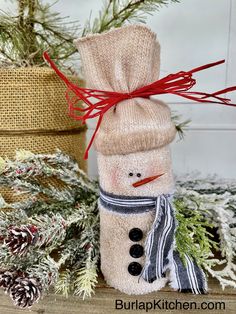 a snowman made out of a sweater and scarf