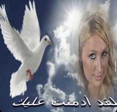 a beautiful woman with white doves in the sky