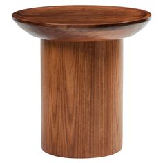 a wooden table with a circular top on it's side, against a white background