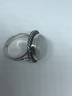 Large Vintage ring set with huge Rainbow Moonstone. Low content silver not sterling About an in long Size 8.75 can be resized at my jeweler for a $10-$20 fee All rings are shipped free in the US in a nice gift box. Check out our over a THOUSAND great reviews Engraving is $4 per letter and is not always perfect depending on the piece. It can take a few days if the jeweler is busy. This is payable to Paypal Judithsltd@gmail.com White Rings With Large Stone, Silver Moonstone Ring With Cabochon Cut, Silver Rings With Large Round Stone, Vintage Silver Round Moonstone Ring, Large Moonstone Promise Ring, Vintage Silver Moonstone Ring With Large Stone, Silver Moonstone Ring With Large Stone, White Crystal Ring With Large Round Stone, Adjustable Silver Moonstone Ring With Large Stone