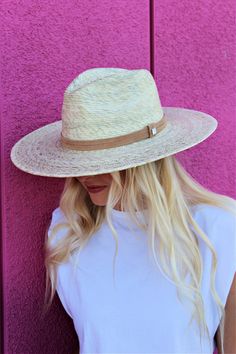 Handmade by artisans in Mexico, our new 100% baked palm leaf Islander Hat is perfect for spring and summer wear. Featuring a molded crown and tightly woven pressed palm, this hat offers the most sun protection. Embellished with a faux suede band and exclusive cut Swarovski crystals. - Hat is not adjustable, has the elastic band on the inside - Show with our "Designer Inspired" Hat Bands Adjustable Flat Crown Toquilla Straw Hat, Natural Braided Straw Hat With Flat Brim, Artisan Hats For Beach And Kentucky Derby, Artisan Natural Fedora For Beach, White Flat Crown Fedora For Beach, White Flat Crown Fedora For The Beach, White Flat Crown Hat Bands For Beach, Summer Fedora With Curved Brim Made Of Palm Leaf, Western Style Straw Hat For Beach With Flat Crown